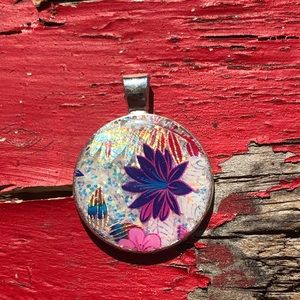 Purple flower and glitter pendant